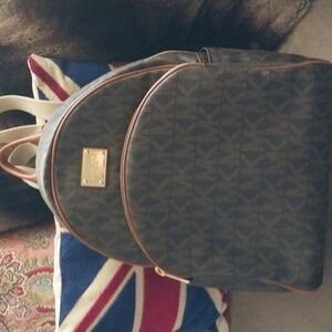 Michael Kors monogram backpack coated cotton double entry. Used once Gorgeous